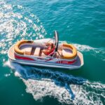 Sea Doo pontoon boat on water